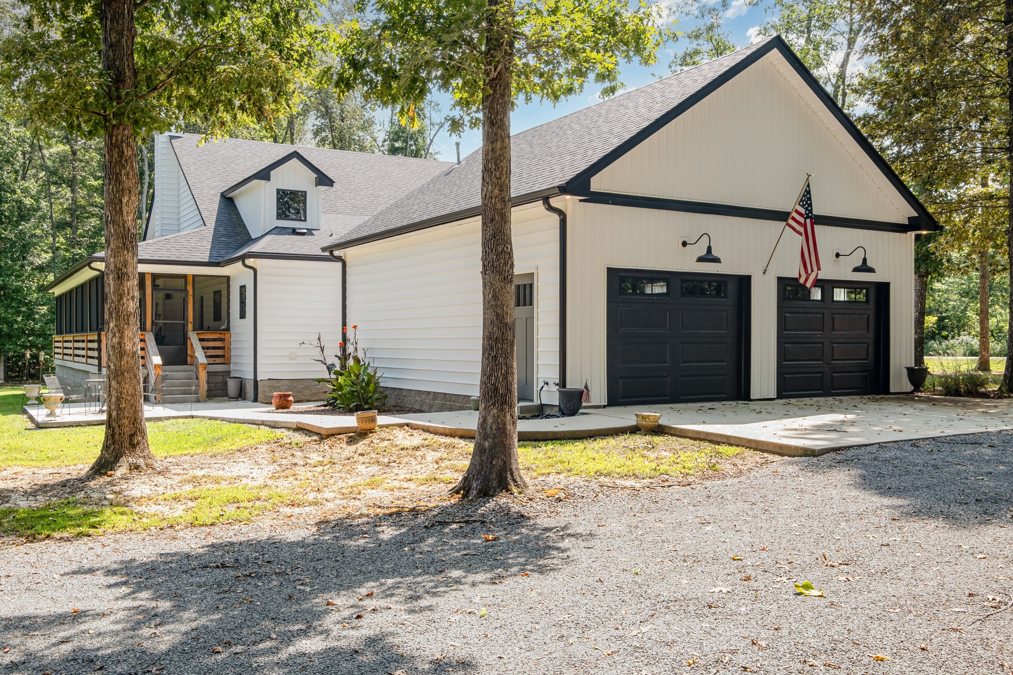 8129 Hollow Springs Road Bradyville, TN 37026 - Photo 6 of 42 a view of a house with small yard and large tree