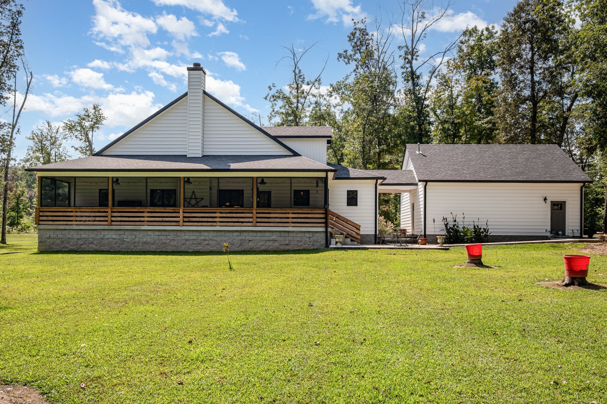8129 Hollow Springs Road Bradyville, TN 37026 - Photo 7 of 42 a view of a house with swimming pool and sitting area