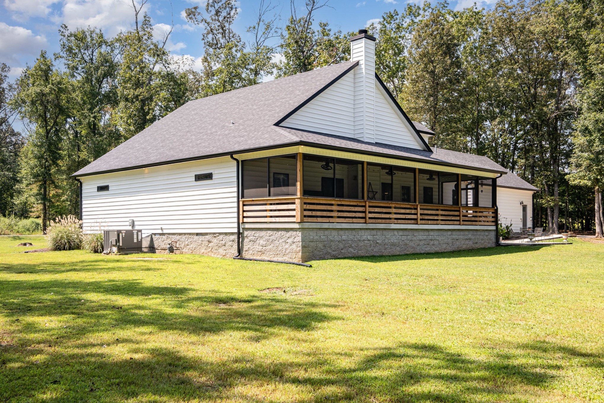 8129 Hollow Springs Road Bradyville, TN 37026 - Photo 8 of 42 a front view of a house with a swimming pool