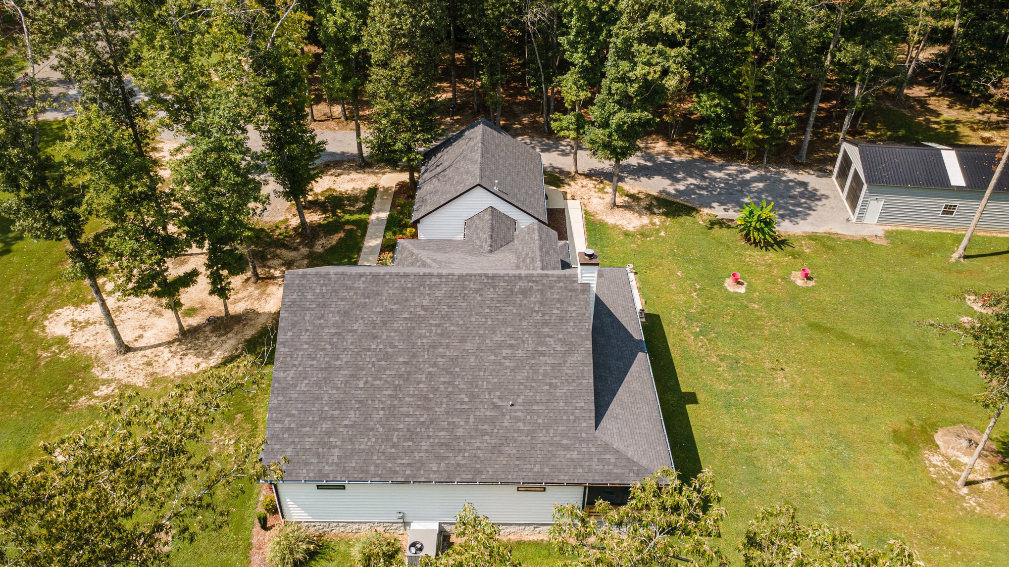 8129 Hollow Springs Road Bradyville, TN 37026 - Photo 9 of 42 a aerial view of a house with large trees