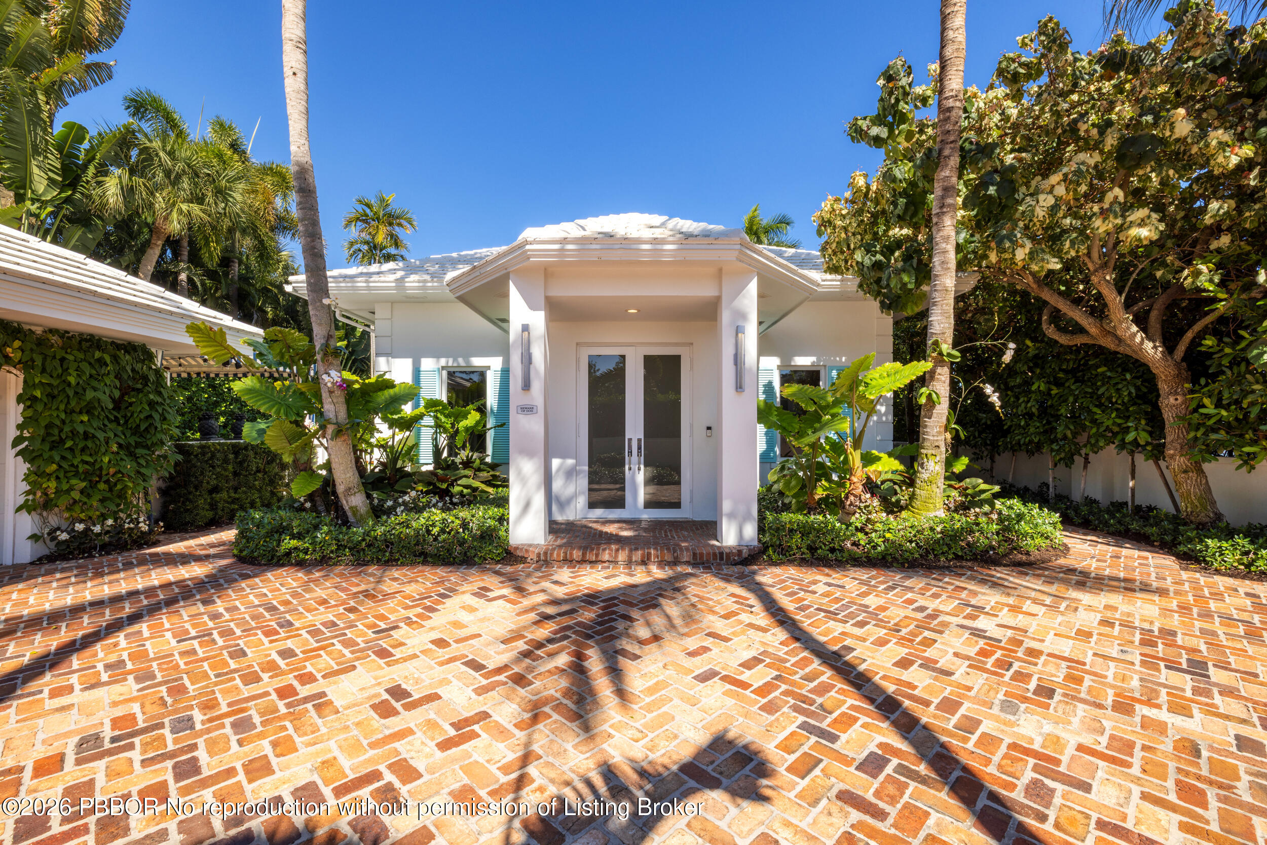 121 Seville Road West Palm Beach, FL 33405 - Photo 8 of 67 a front view of a house with a yard