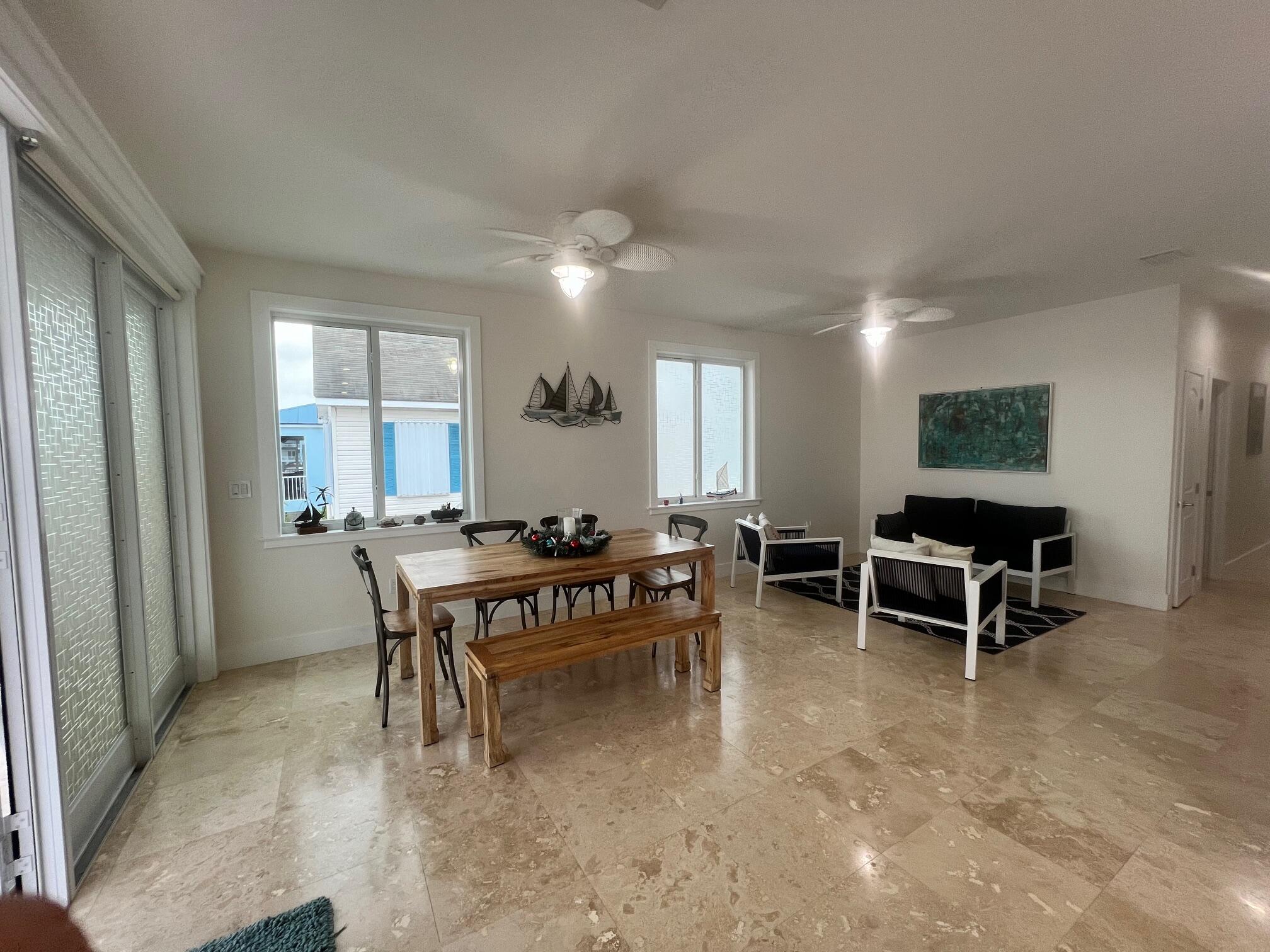 4 Pelican Road Key Largo, FL 33037 - Photo 6 of 15 a view of a livingroom with furniture and window in it
