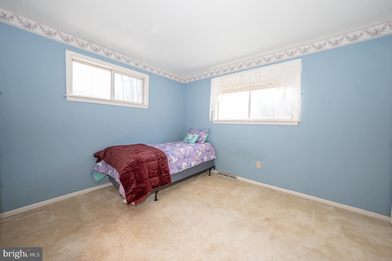 192 Maryhill Road Phoenixville, PA 19460 - Photo 14 of 35 a room with a bed and a window
