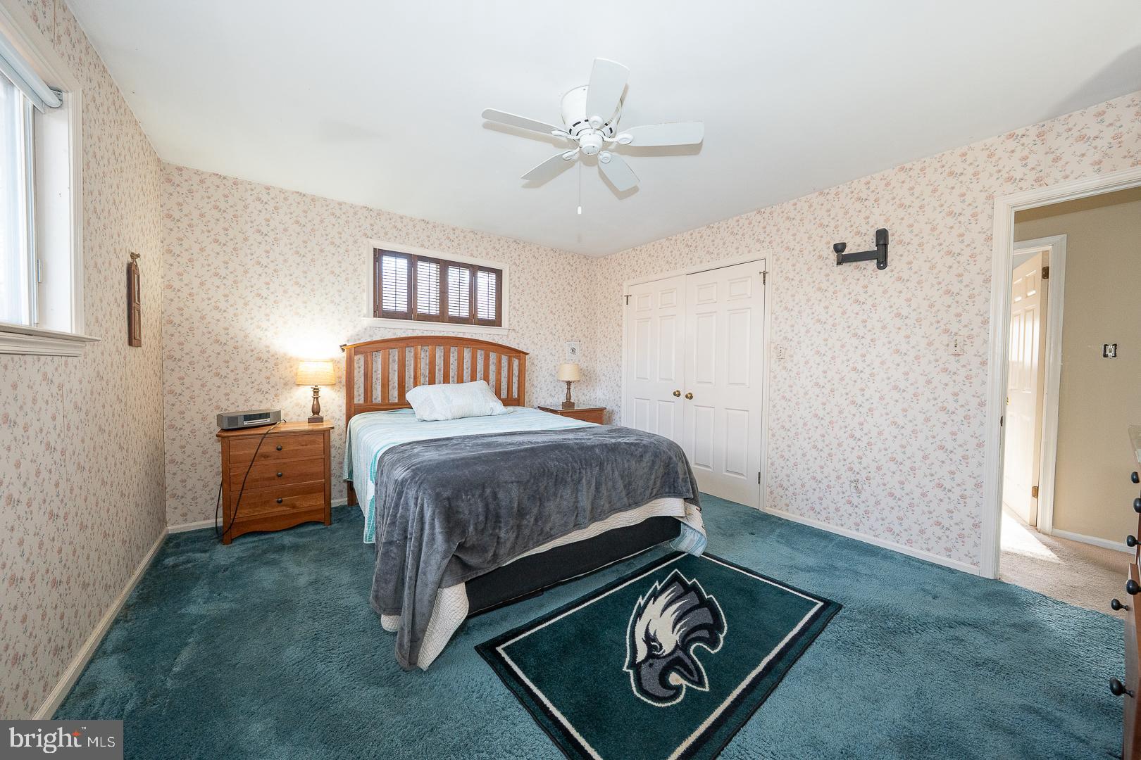 192 Maryhill Road Phoenixville, PA 19460 - Photo 19 of 35 a bedroom with a bed and a chandelier