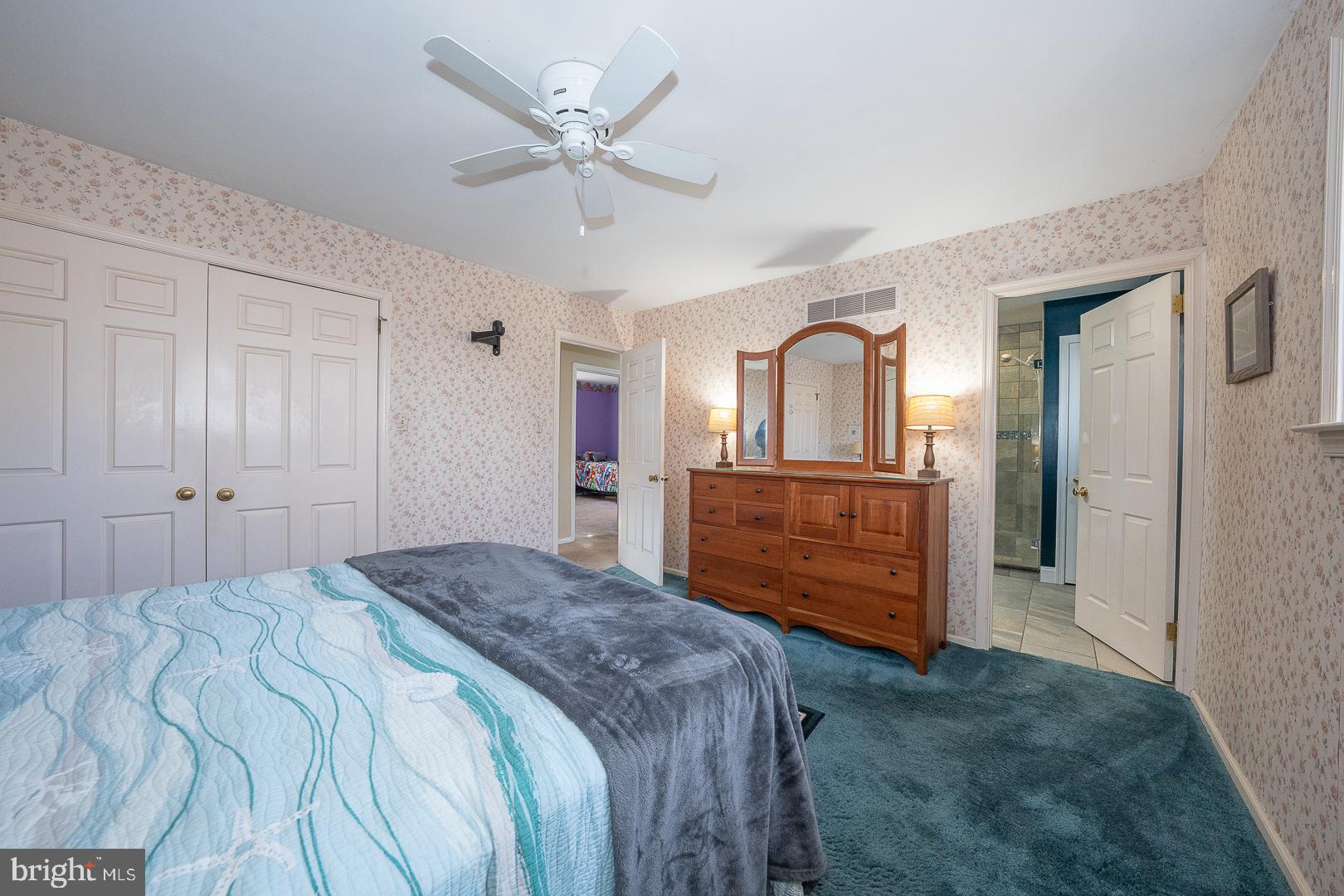 192 Maryhill Road Phoenixville, PA 19460 - Photo 20 of 35 a bed room with a bed and a mirror