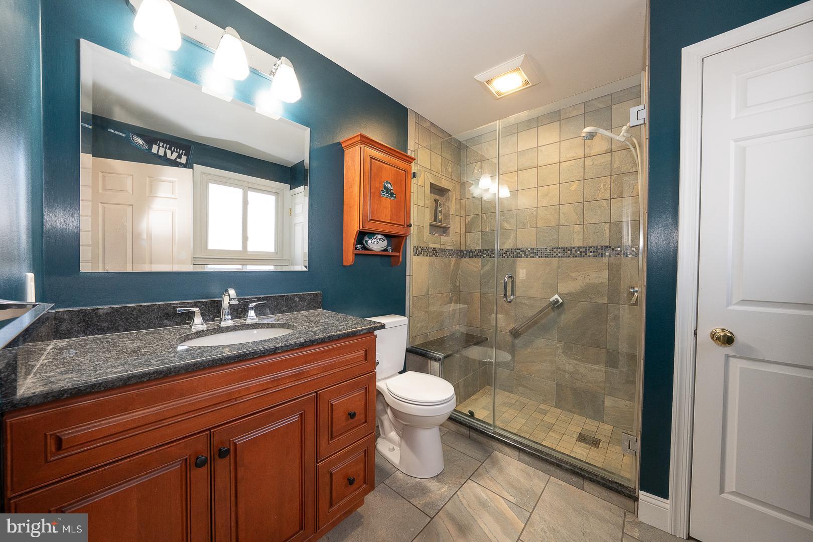 192 Maryhill Road Phoenixville, PA 19460 - Photo 21 of 35 a bathroom with a granite countertop sink toilet and shower