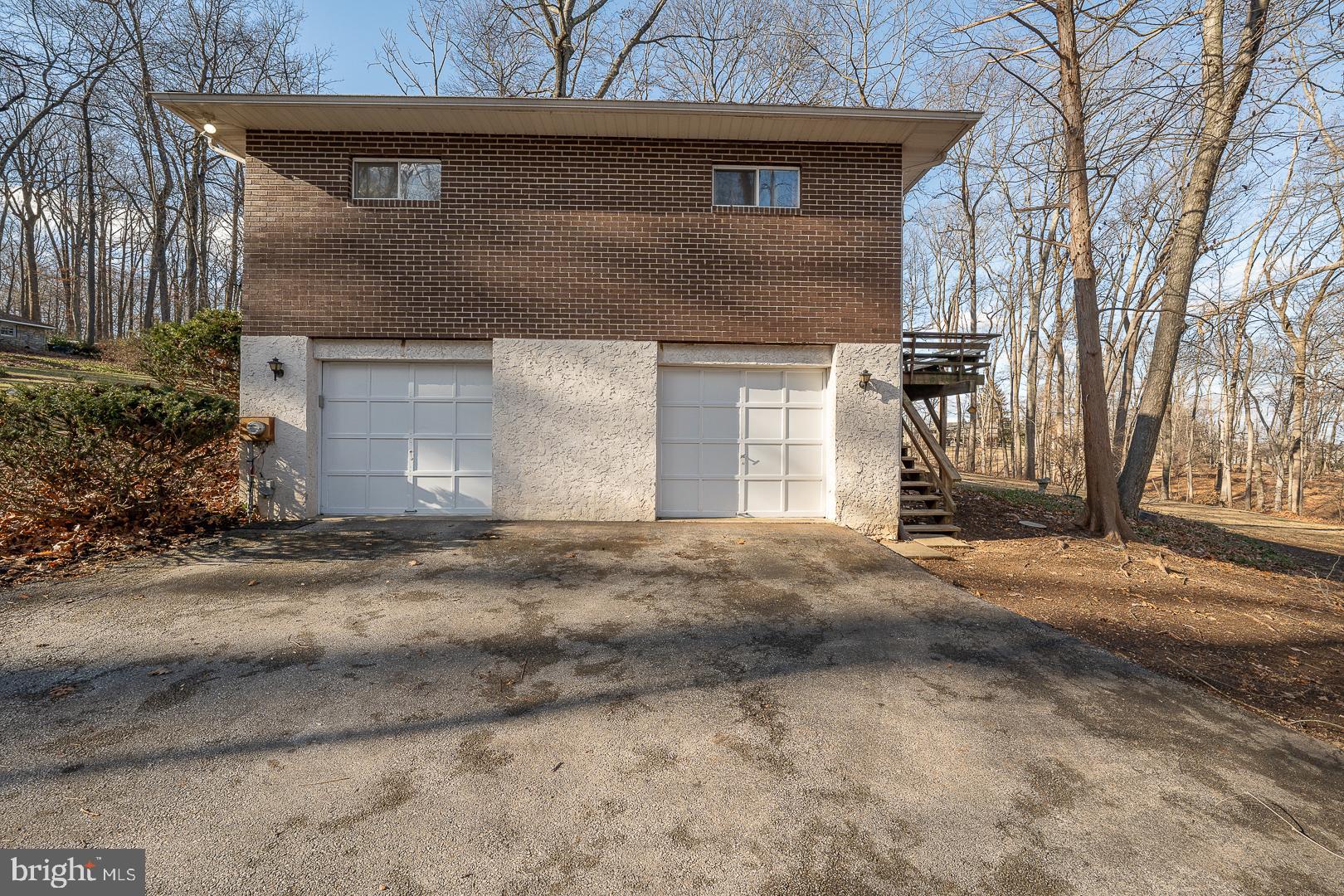 192 Maryhill Road Phoenixville, PA 19460 - Photo 34 of 35 a front view of a house with a yard and garage