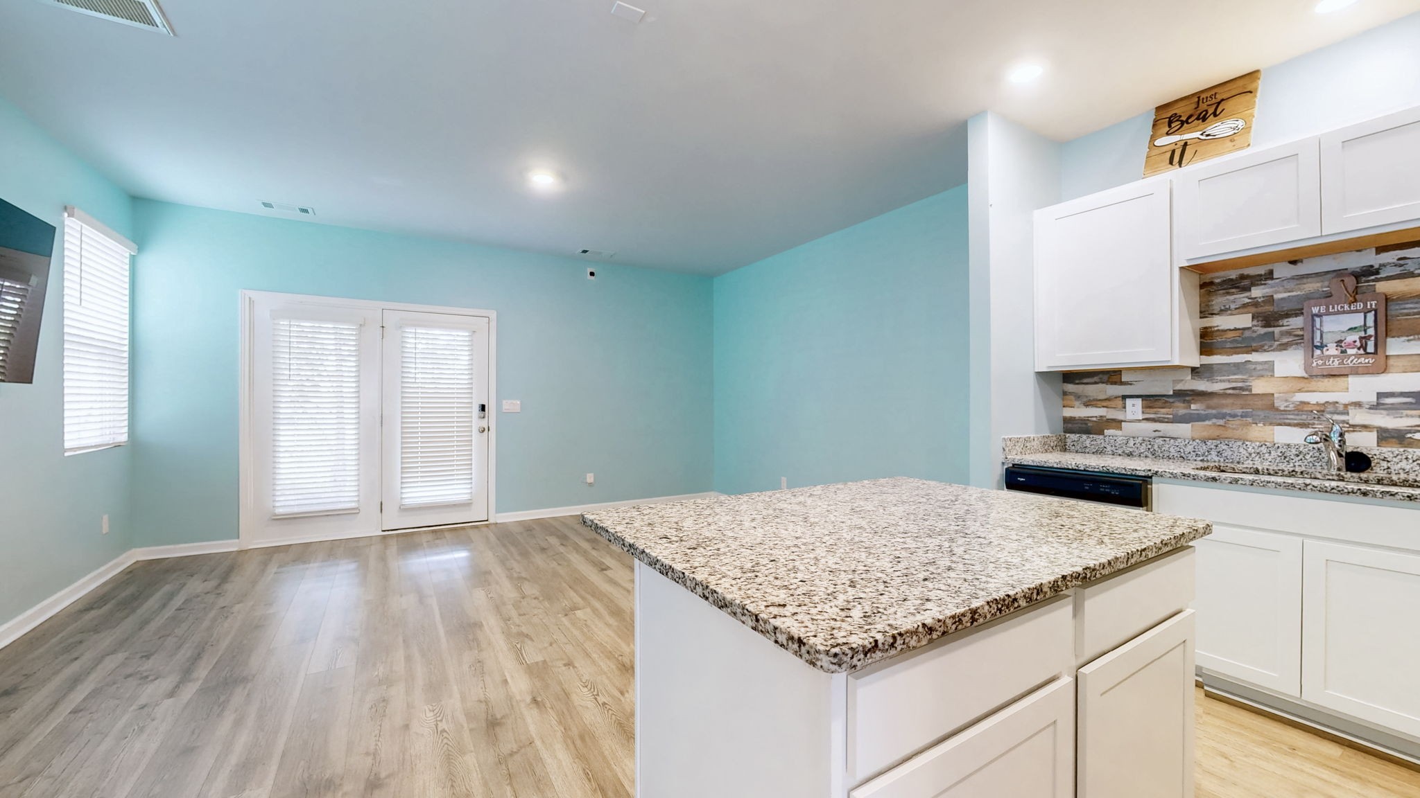110 Cecil Road Lebanon, TN 37087 - Photo 8 of 44 a kitchen with granite countertop a stove and a wooden floors
