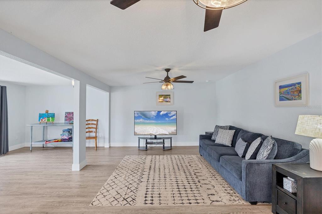 2254 Hayworth Road Port Charlotte, FL 33952 - Photo 4 of 48 a living room with furniture and a table