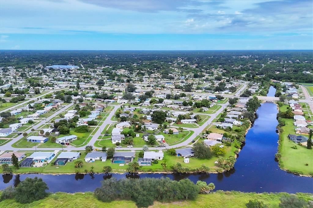 2254 Hayworth Road Port Charlotte, FL 33952 - Photo 42 of 48 an aerial view of residential houses with outdoor space and swimming pool
