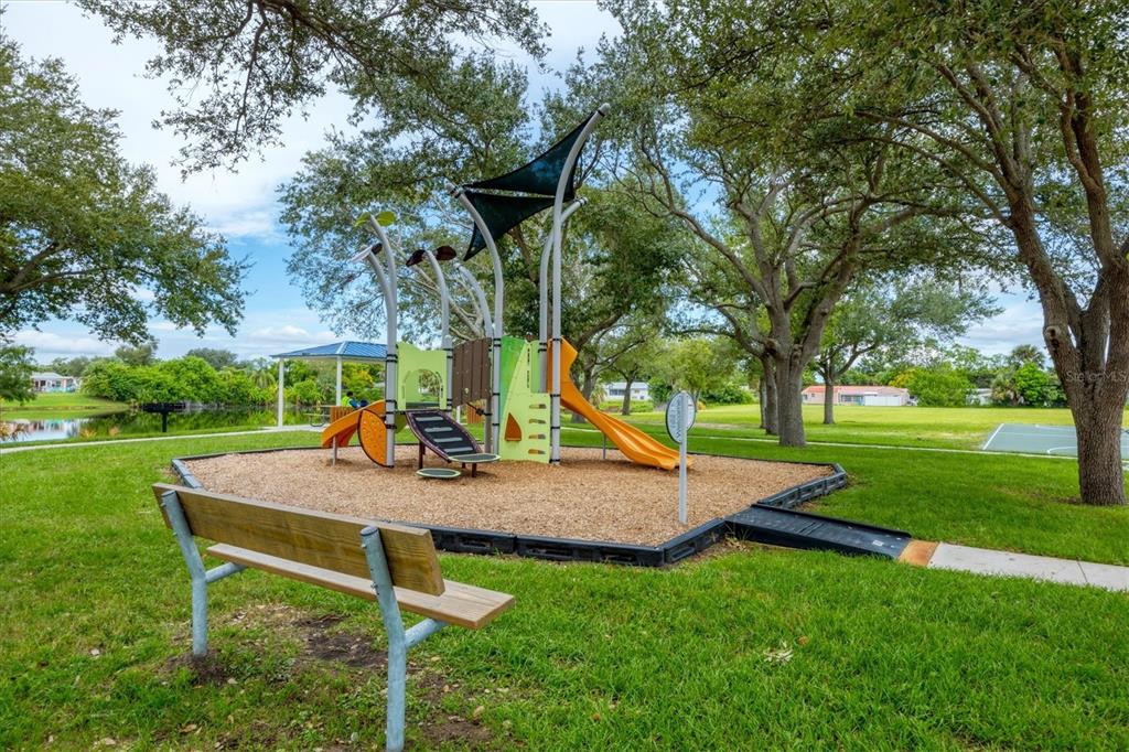 2254 Hayworth Road Port Charlotte, FL 33952 - Photo 48 of 48 a view of a backyard with table and chairs