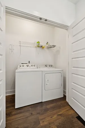 a utility room with washer and dryer