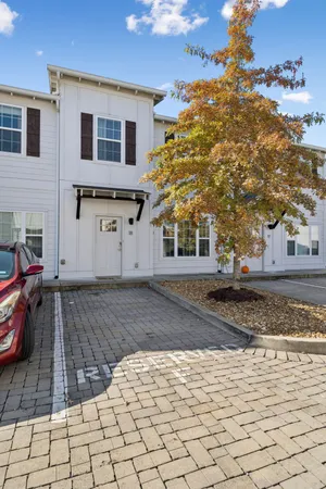 a view of a backyard of the house