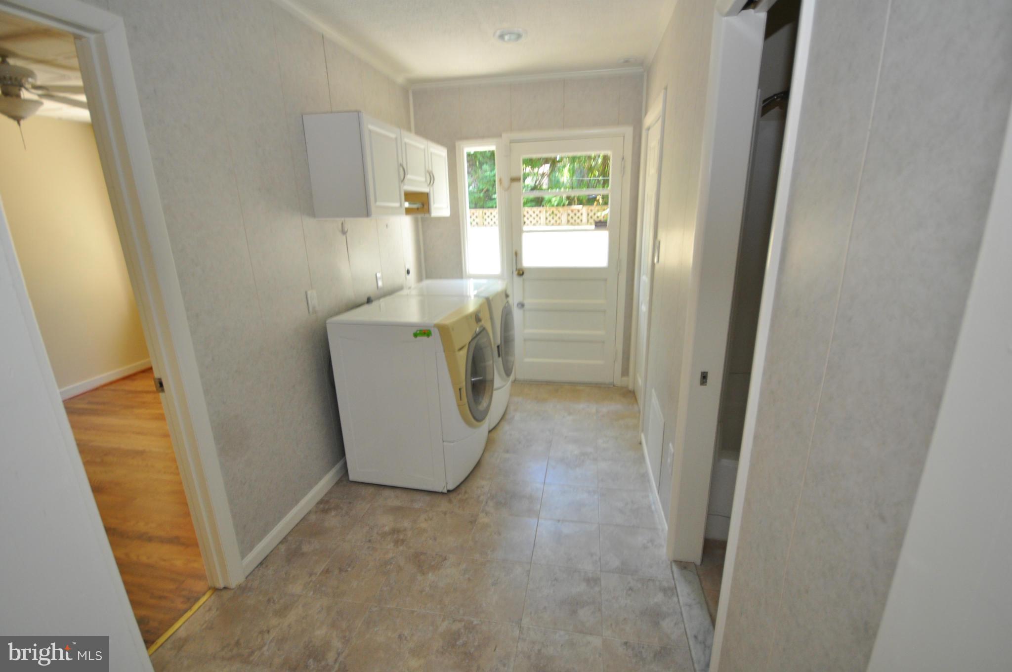 18314 Sharon Road Triangle, VA 22172 - Photo 22 of 30 a utility room with a window dryer and washer