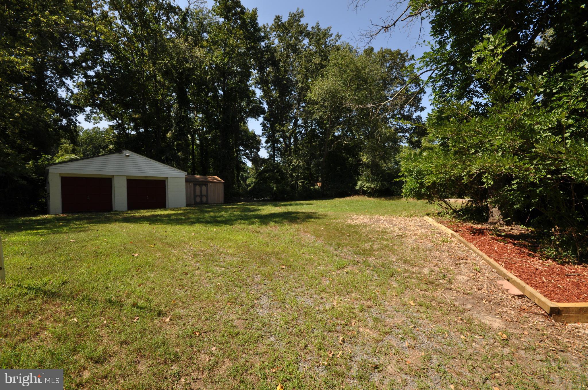 18314 Sharon Road Triangle, VA 22172 - Photo 28 of 30 a house with trees in front of it