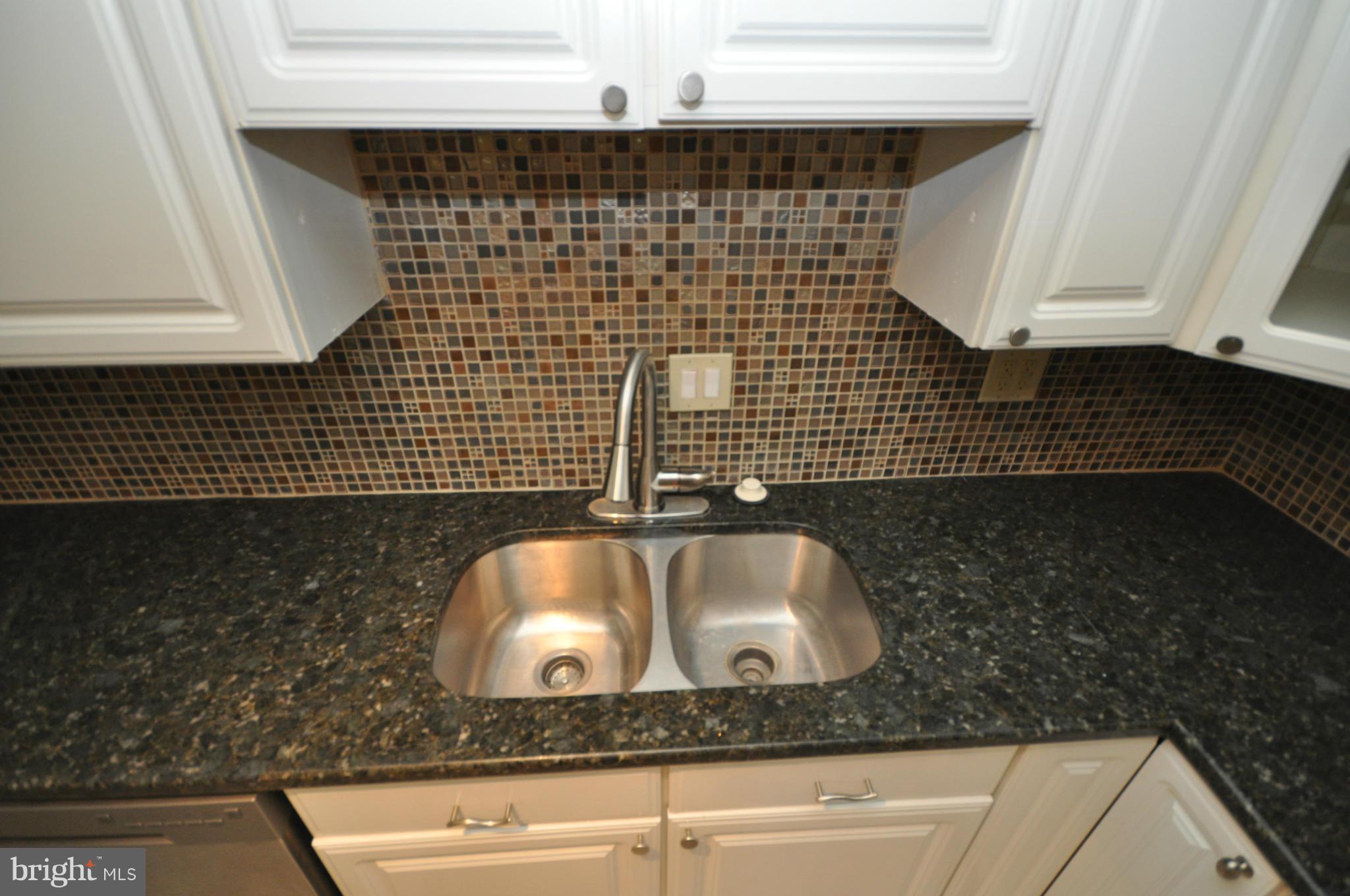 18314 Sharon Road Triangle, VA 22172 - Photo 7 of 30 a bathroom with a sink