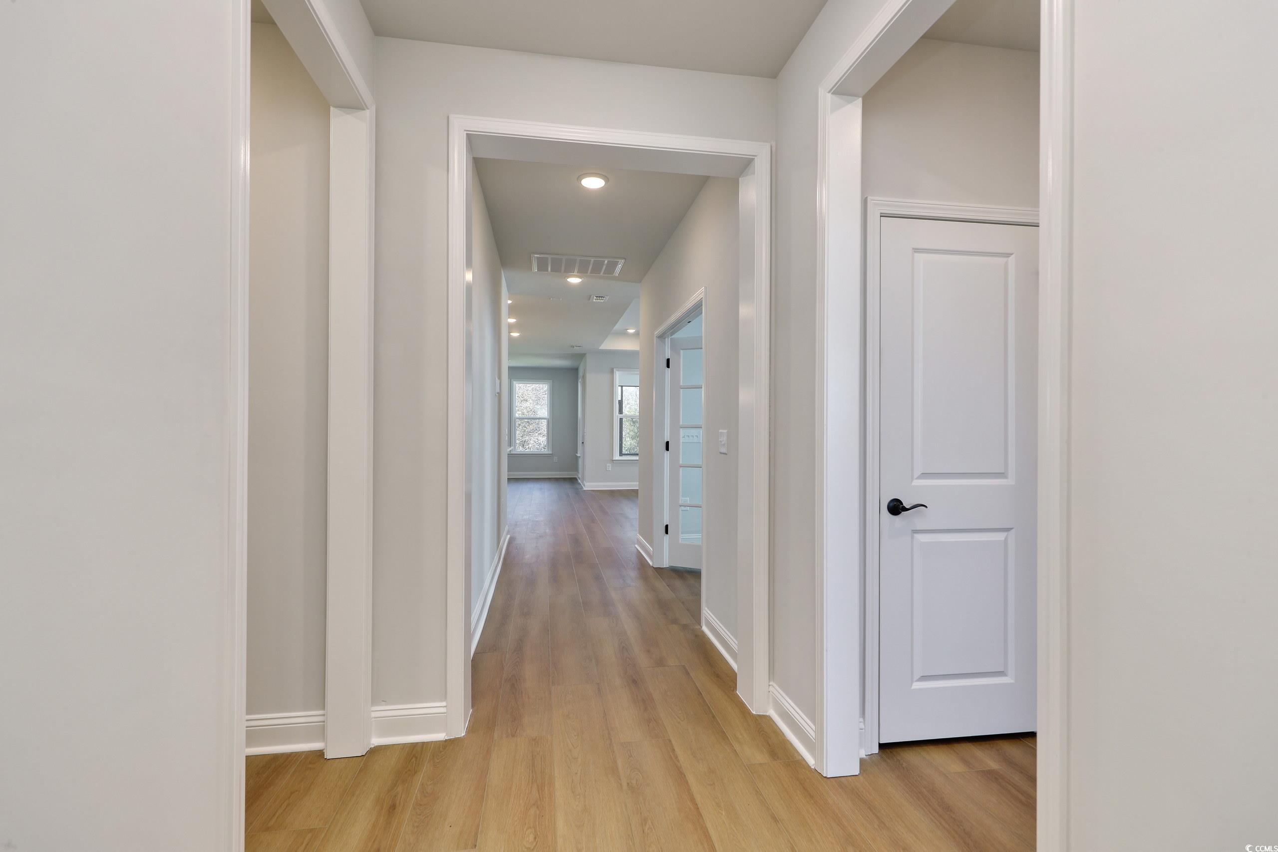 1613 Littleleaf Loop North Myrtle Beach, SC 29582 - Photo 6 of 39 Hall with light wood-type flooring