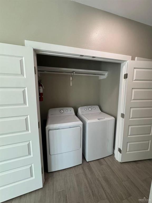 5609 Nightingale Avenue, Unit 4 Mission, TX 78573 - Photo 8 of 13 a utility room with dryer and washer