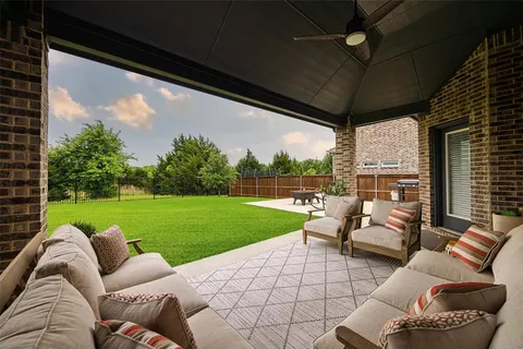 a outdoor living space with furniture and garden