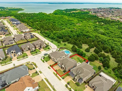 an aerial view of a house with a outdoor space