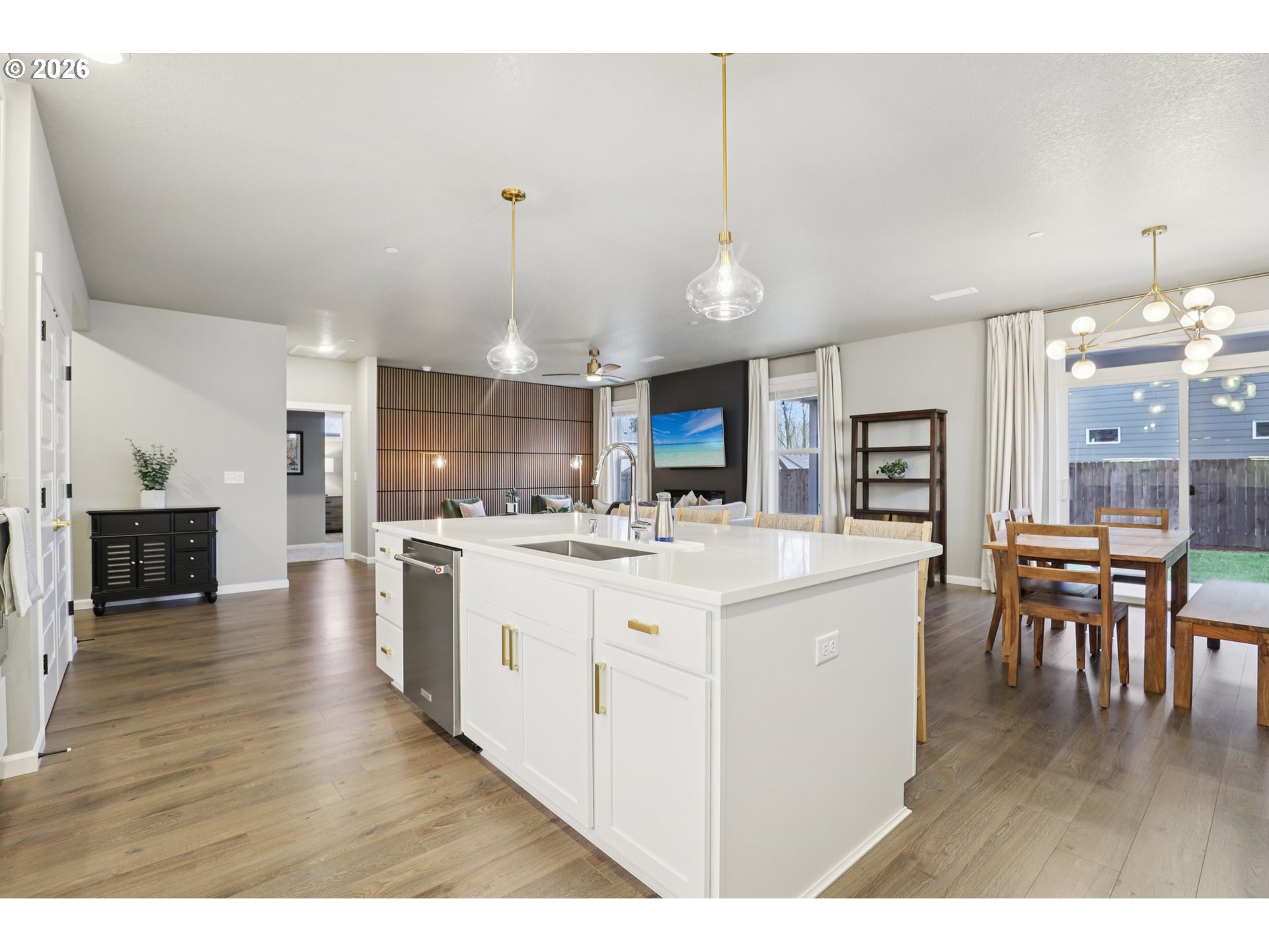 604 Northwest 25th Way Battle Ground, WA 98604 - Photo 11 of 33 a large kitchen with a table and chairs