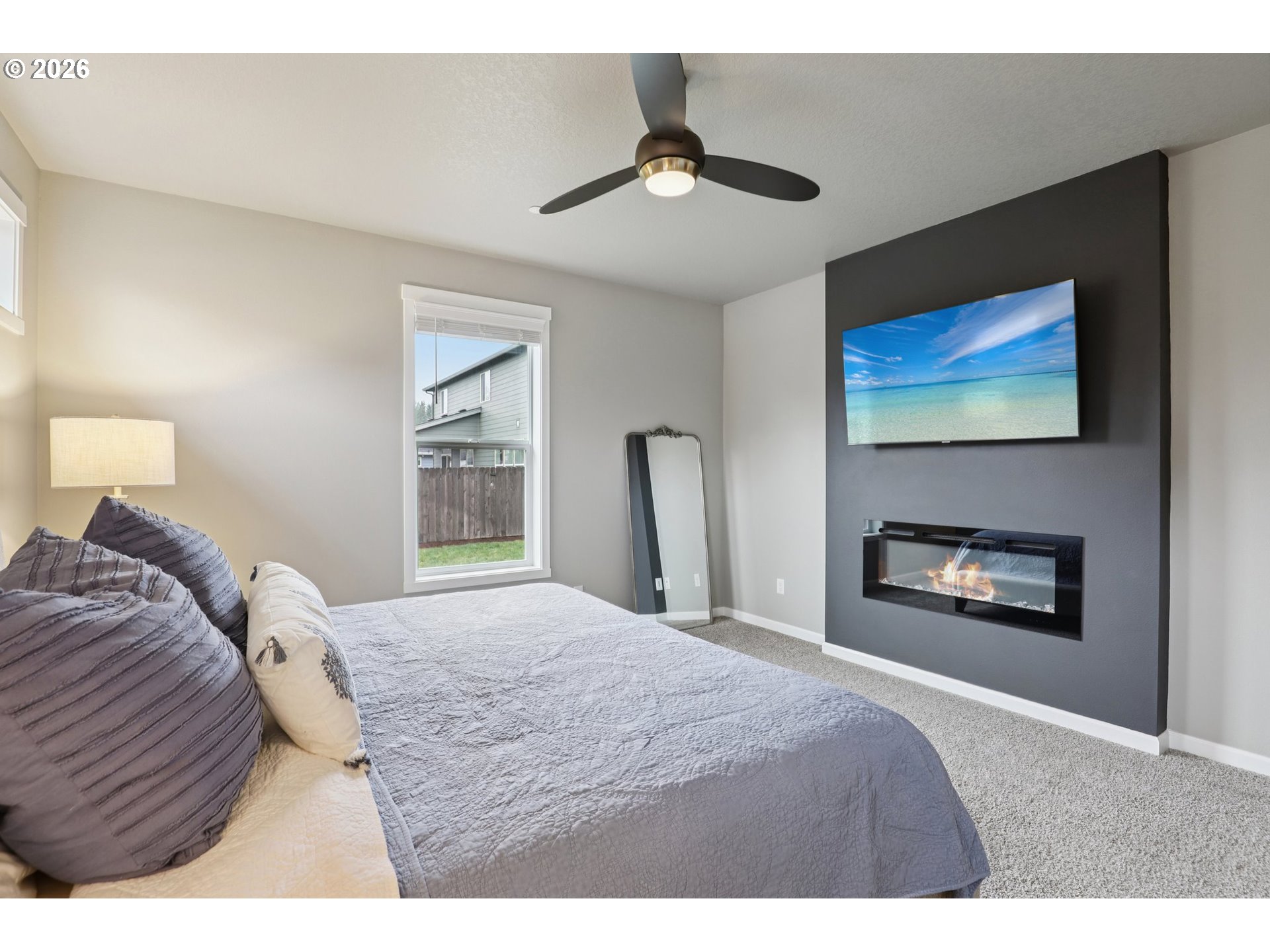 604 Northwest 25th Way Battle Ground, WA 98604 - Photo 18 of 33 a bedroom with a bed and a painting on the wall
