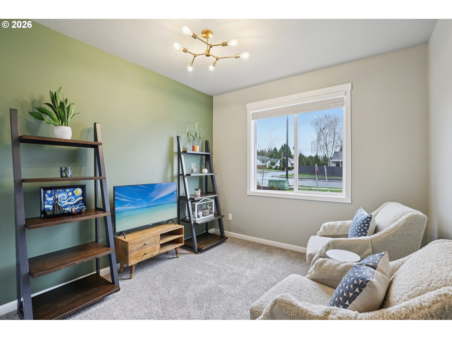 604 Northwest 25th Way Battle Ground, WA 98604 - Photo 22 of 33 a living room with furniture and a window