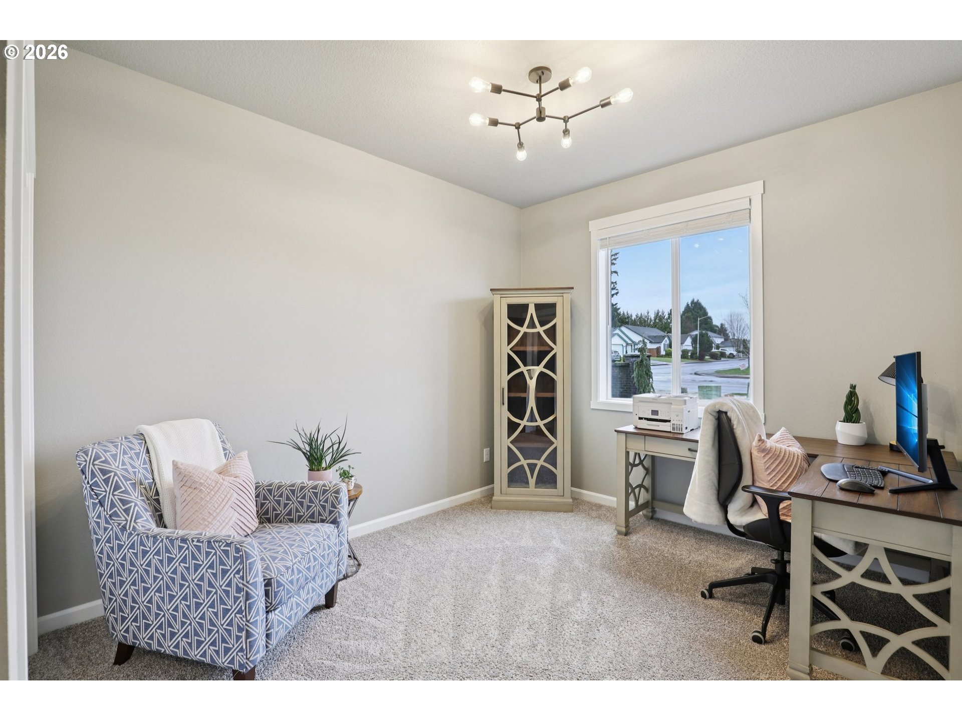 604 Northwest 25th Way Battle Ground, WA 98604 - Photo 25 of 33 a living room with furniture and a window