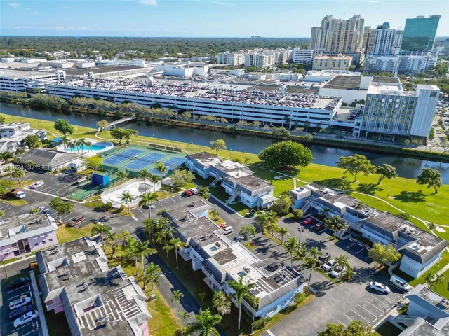 a view of a city with lawn chairs