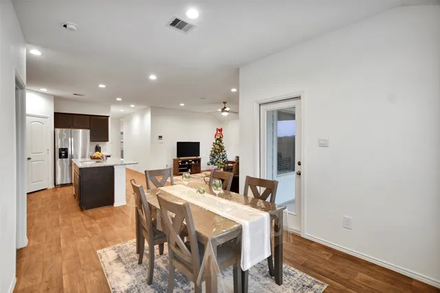a bath tub sitting next to a shower