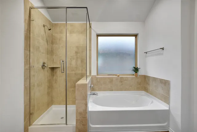 a front view of a house with yard patio and fire pit