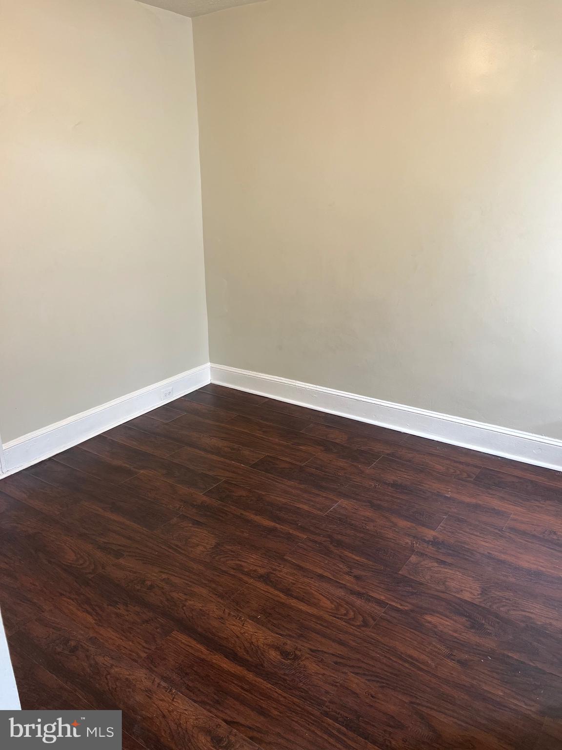 2910 Poplar Terrace Baltimore, MD 21216 - Photo 13 of 14 a view of an empty room with wooden floor