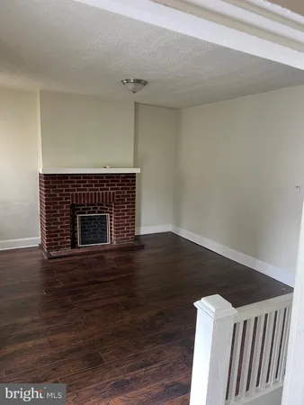 a living room with wooden floor