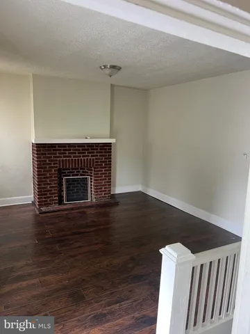 a living room with wooden floor