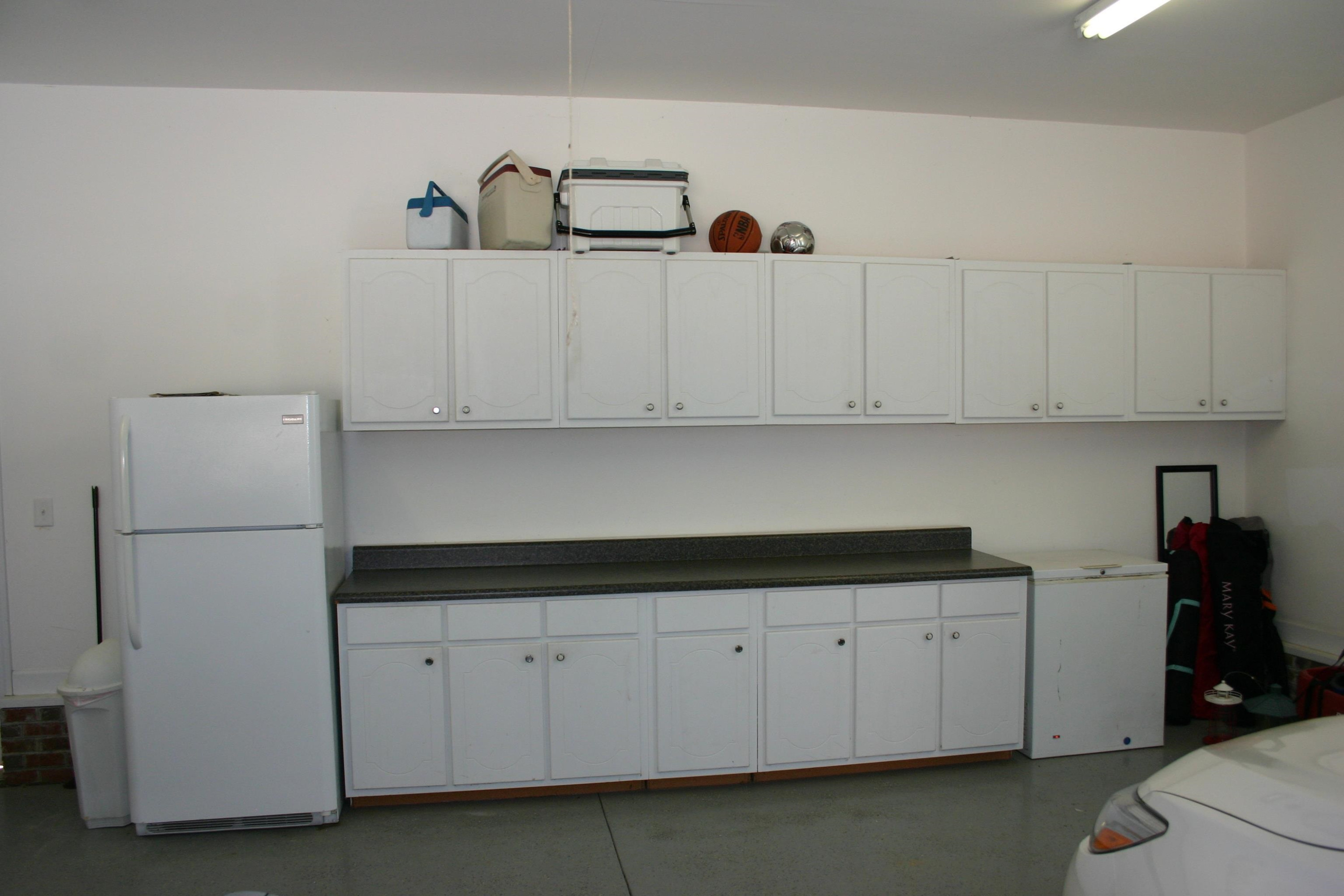 728 Jack Road Clayton, NC 27520 - Photo 15 of 25 Cabinet storage in garage