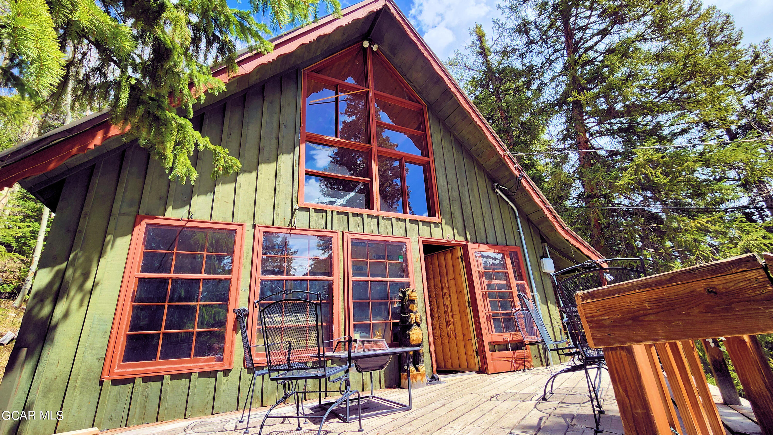 573 97 Circle Breckenridge, CO 80424 - Photo 1 of 40 a view of a house with a door and wooden stairs