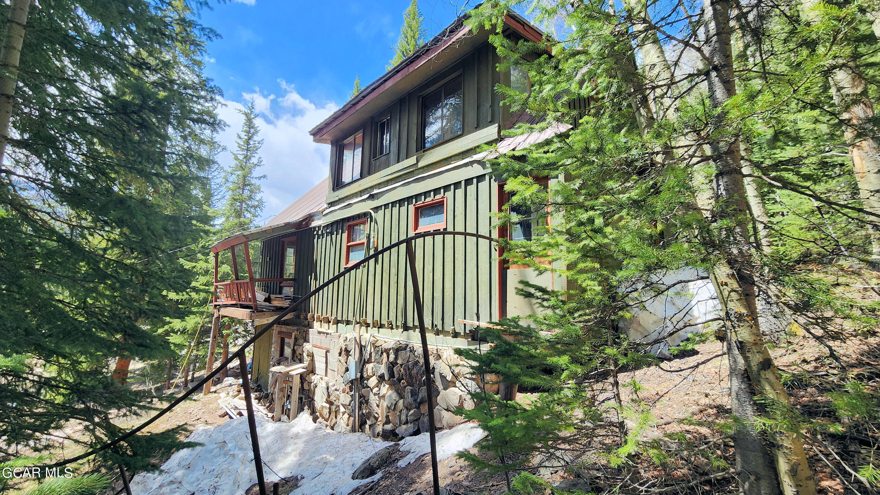 573 97 Circle Breckenridge, CO 80424 - Photo 28 of 40 a view of a house with a small yard and plants