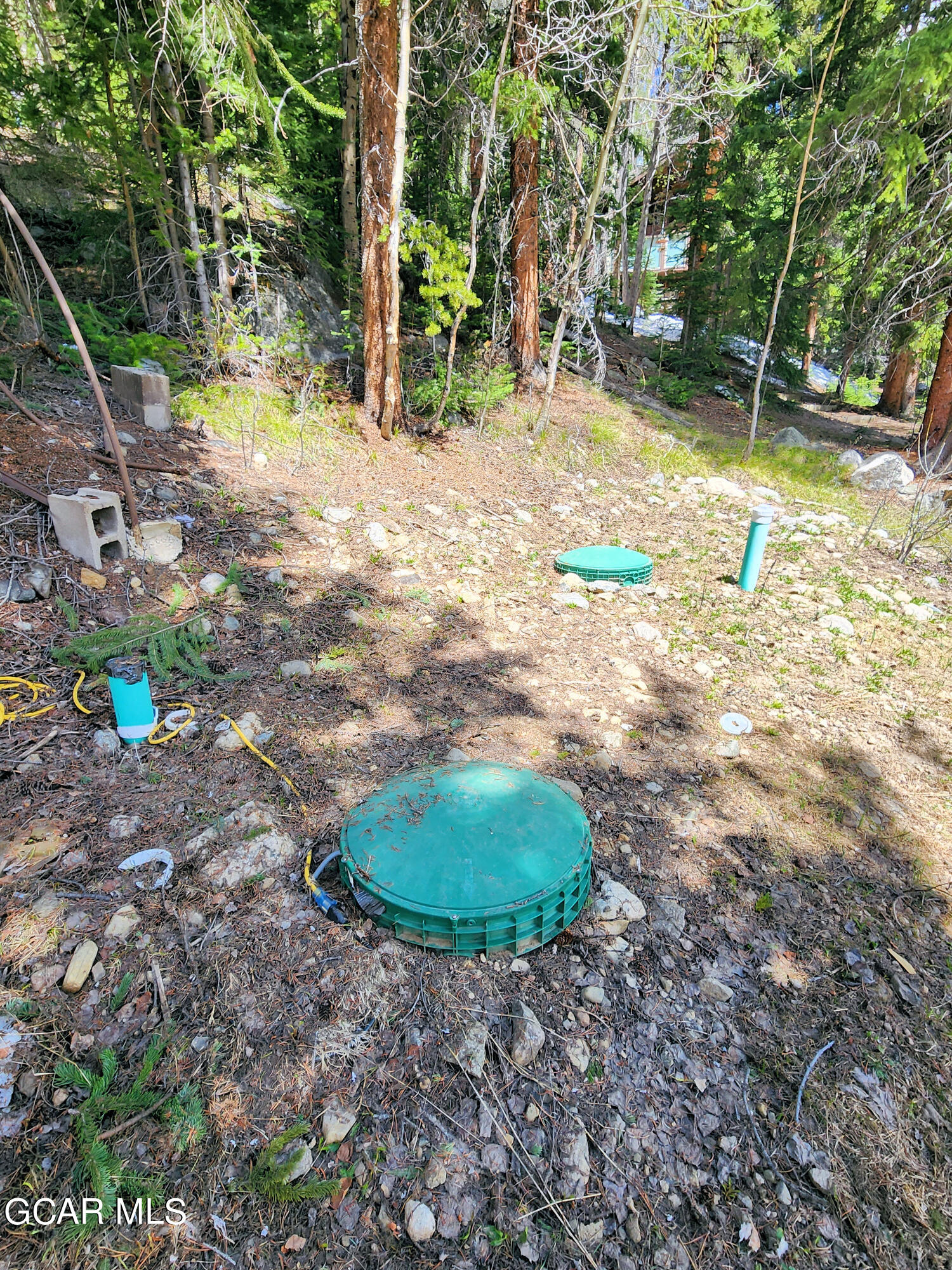 573 97 Circle Breckenridge, CO 80424 - Photo 38 of 40 a backyard of a house with a yard and outdoor seating