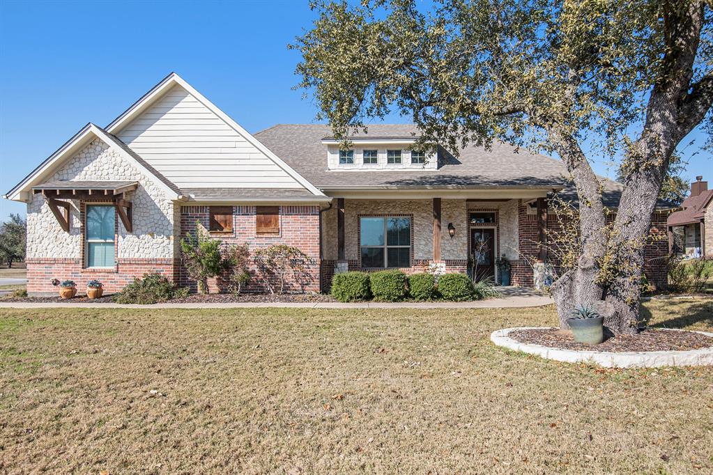 3900 Decordova Ranch Road Granbury, TX 76049 - Photo 1 of 1 View of front facade with a front lawn