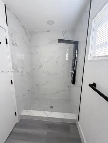 a bathroom with a bathtub