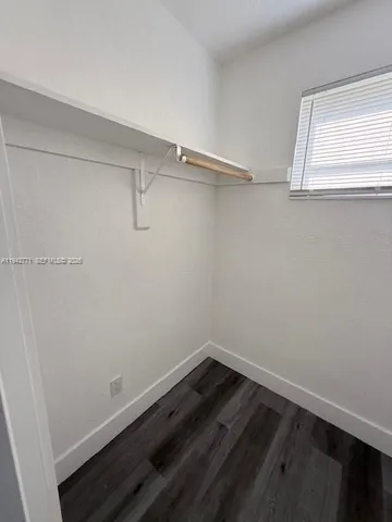 a view of a room with racks on the wall