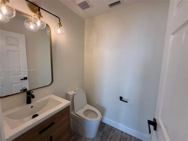 a bathroom with a sink and a toilet