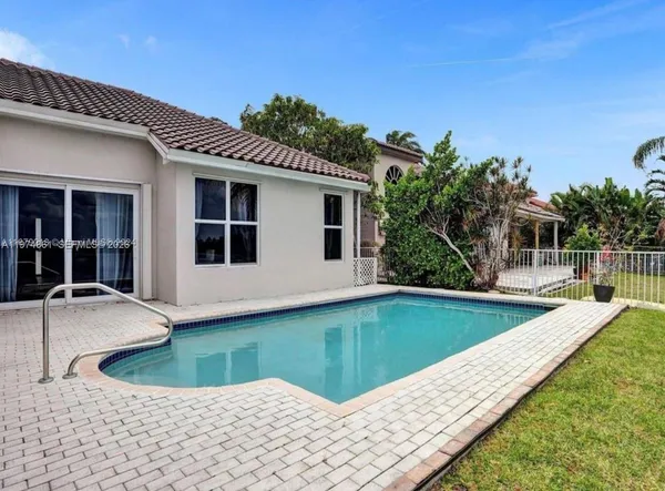 a view of a house with pool