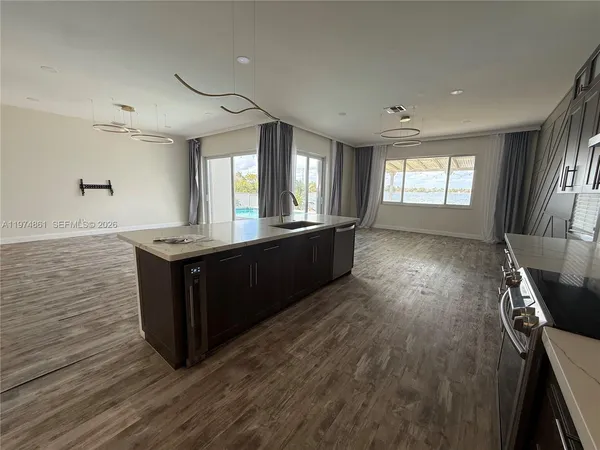a living room with wooden floors and a wooden floors