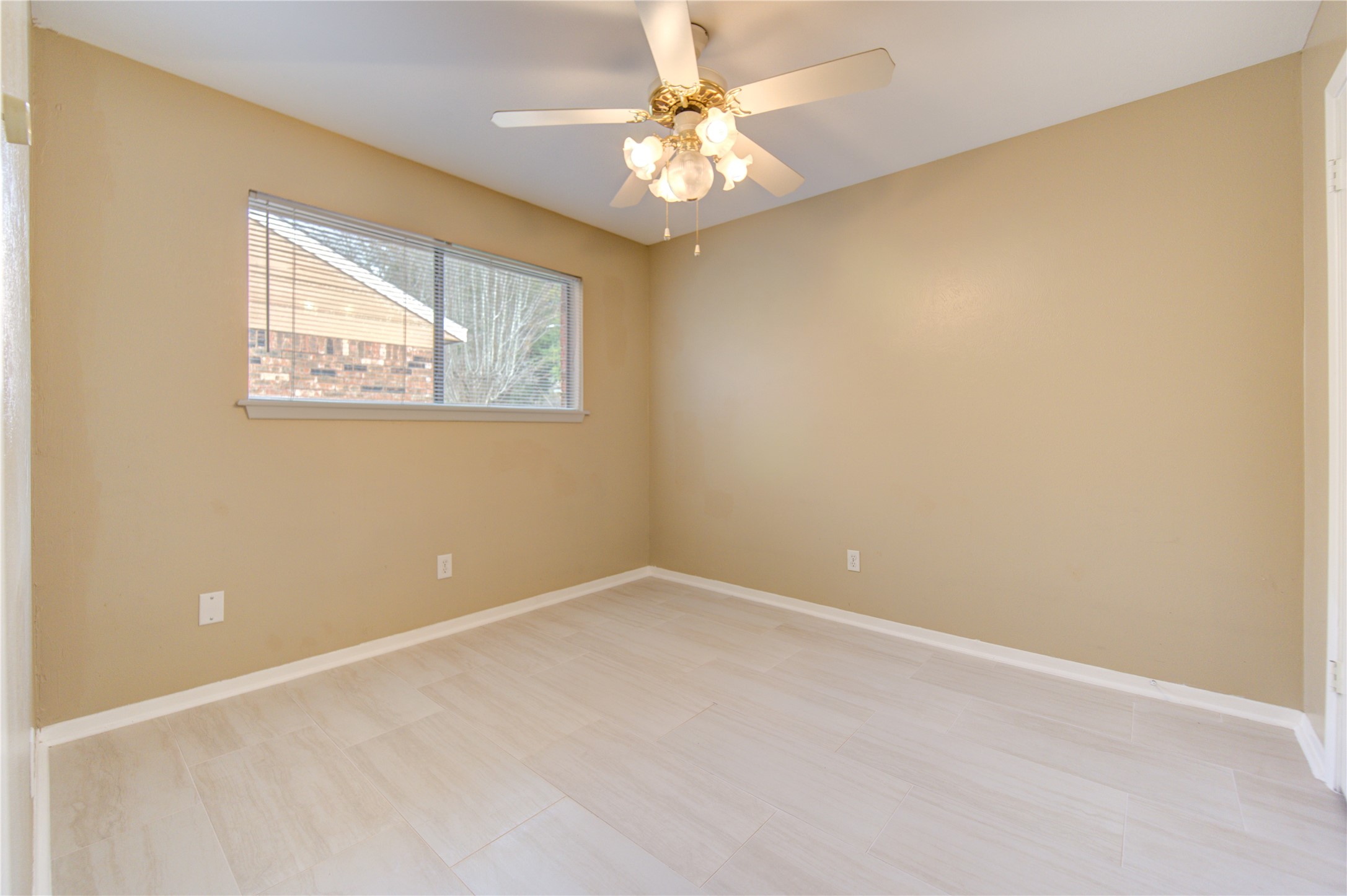 3412 Avenue R Rosenberg, TX 77471 - Photo 37 of 43 a view of an empty room with a window