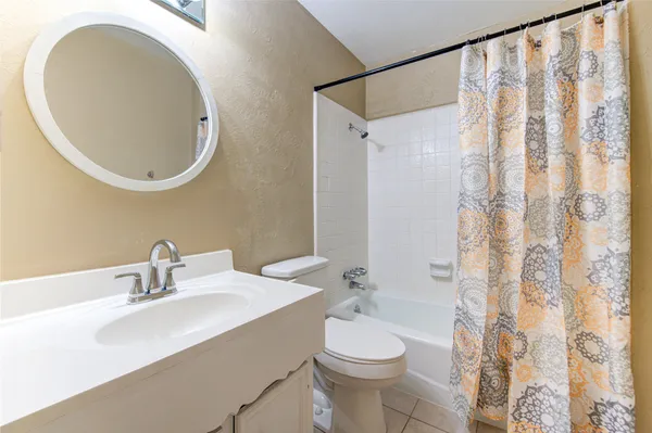 a view of backyard with cabin