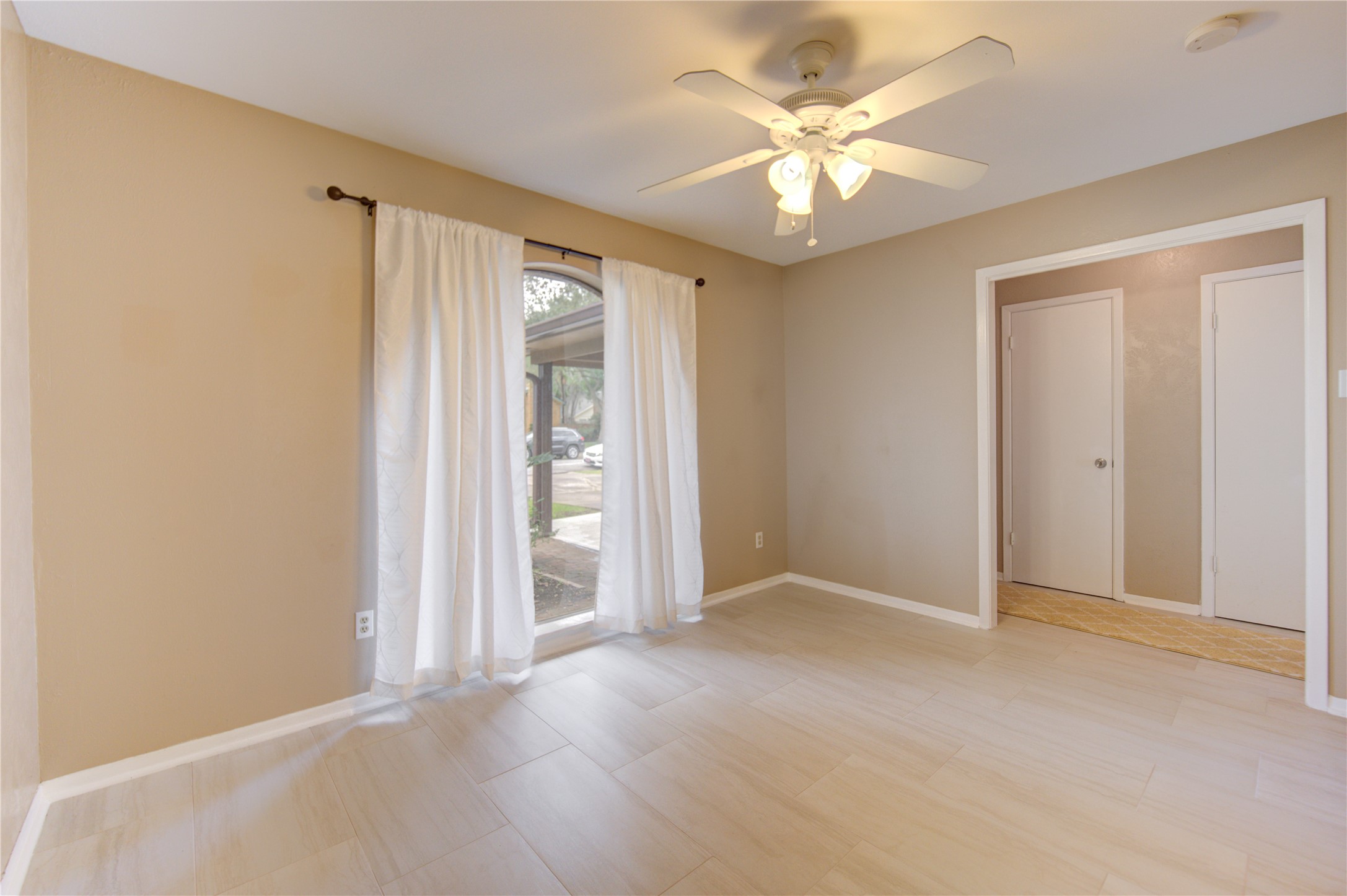 3412 Avenue R Rosenberg, TX 77471 - Photo 8 of 43 a view of an empty room with a window