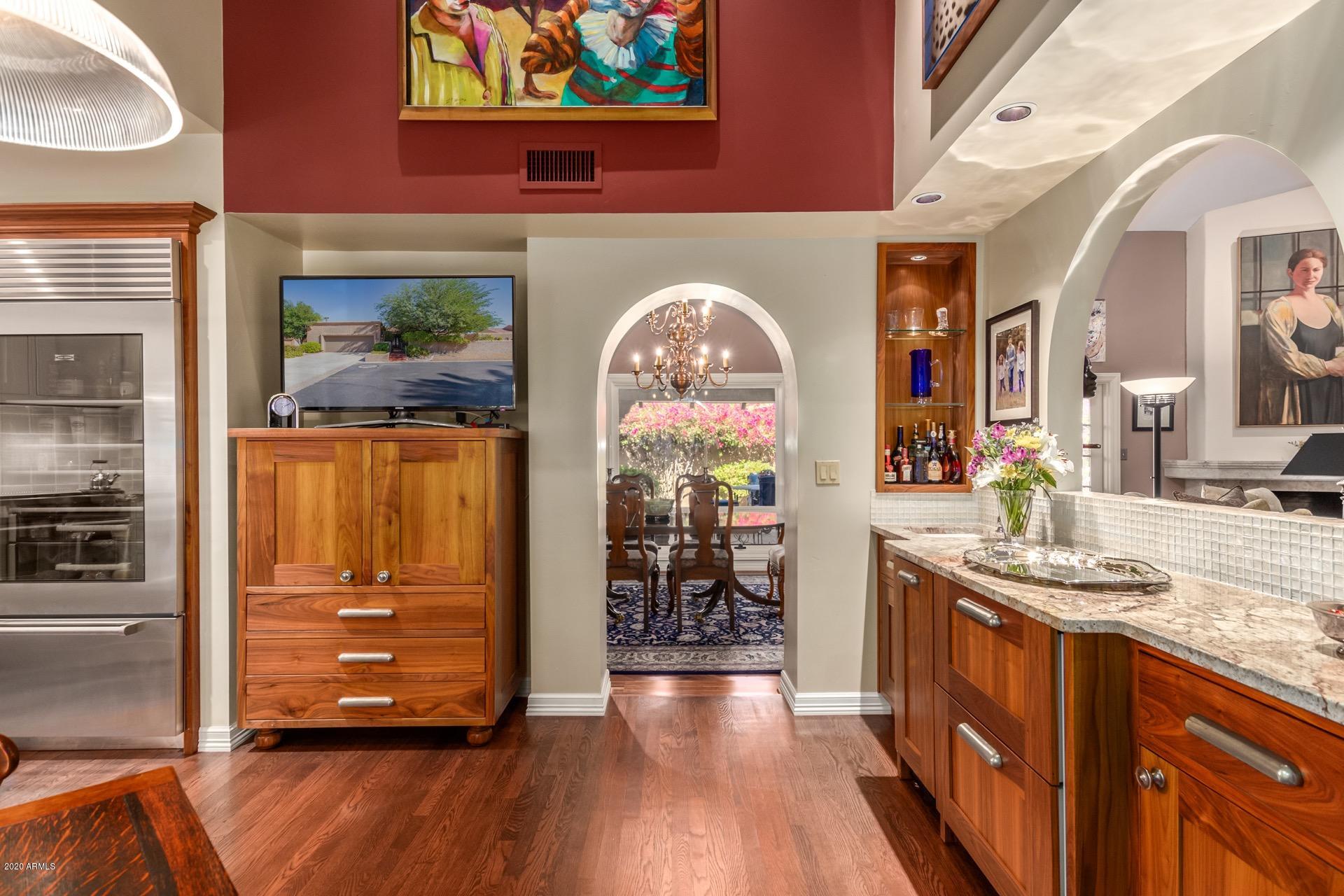 4450 East Camelback Road, Unit 7 Phoenix, AZ 85018 - Photo 17 of 50 wet bar/pantry looking into dining room