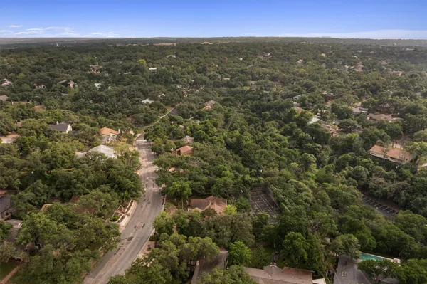 a view of city and green space