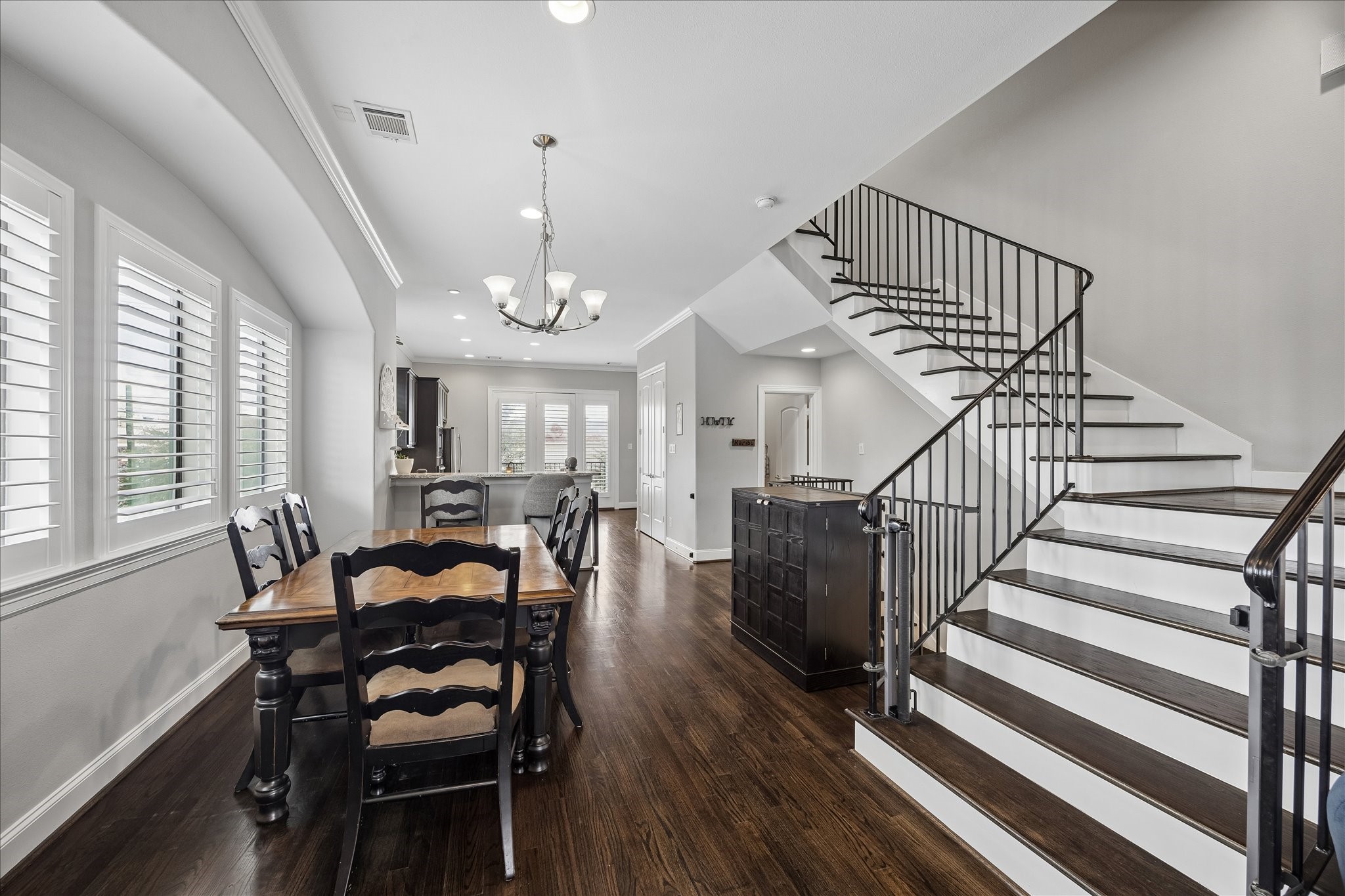 1915 Spring Street Houston, TX 77007 - Photo 17 of 40 A view of the dining room from the main living area toward the kitchen. Note the area by the stairs for your buffet